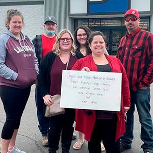 scavenger hunt and fundraiser group outside Goodwill NCW store