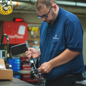 Ben working on wheelchair parts