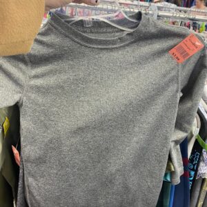 Building a Capsule Wardrobe with simple color schemes like this gray shirt.
