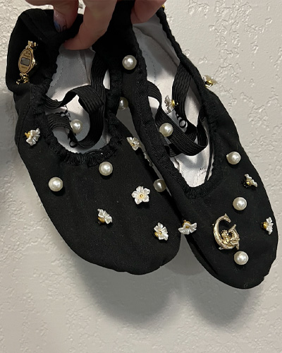 Ballet shoe makeover with sewed-in flower beads, pearls, and a thrifted watch, plus a pierced brooch.