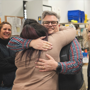 Two team members living out Goodwill NCW's mission