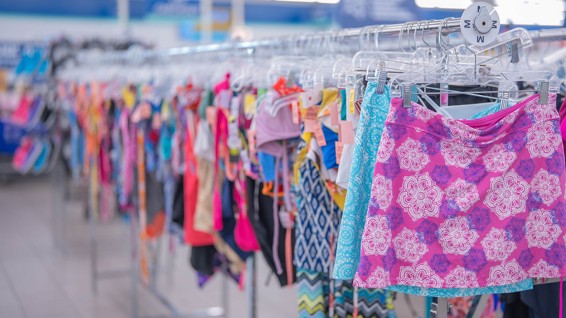 Swimwear Aisle at Goodwill NCW, affordable swimwear Goodwill NCW Header Image