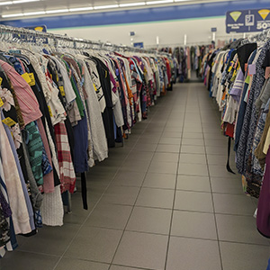image of clothing aisle for back-to-school shopping at Goodwill NCW