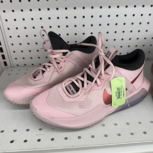 Image of a a shoe aisle for back-to-school shopping at Goodwill NCW